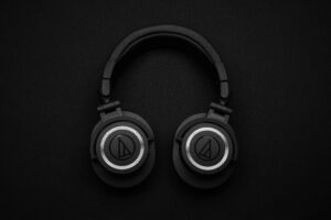 Earplugs or Noise-Canceling Headphones